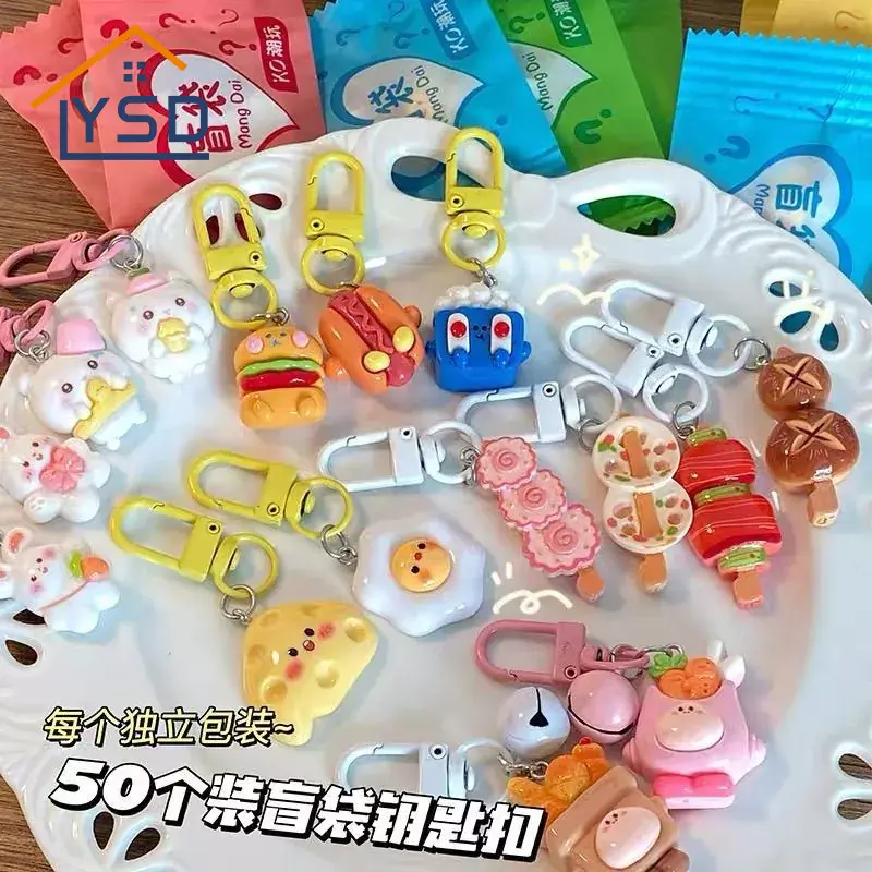 Sokea laukku avaimenperä